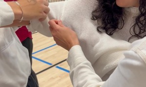 Hedgehog Climbs Up Girl's Sleeve