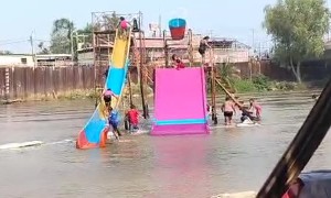 Woman Slips and Falls Down Stairs at Water Park