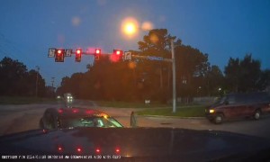Turning Car Drives Directly Into Oncoming Truck's Headlights