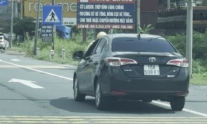Police Officer Rides On Car Hood