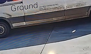 Delivery Driver Jumps Through Van Window Fleeing Dog