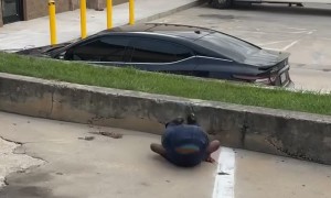 Boy Tries Somersaulting Onto Concrete