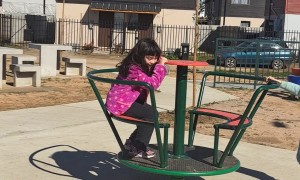 Spinning Kid Picks Treat Off the Ground