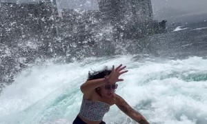 Wave Sweeps Girl Off Her Feet