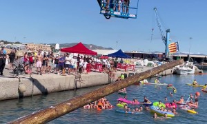Traditional Greased Pole Game in Puerto de Sagunto