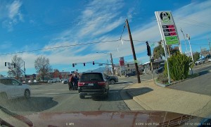 Driver Runs Red Light and Hits Pedestrian in Wheelchair