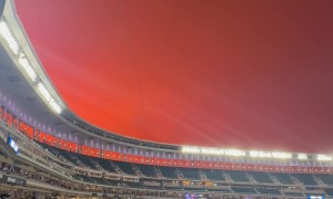 Red Sky with Double Rainbow over Baseball Stadium
