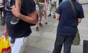 Man Uses Raw Chicken As A Hat