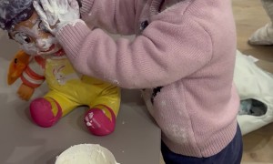 Toddler and Her Doll Get Covered in Cream
