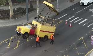 Driver Helped Out Of Rearing Truck
