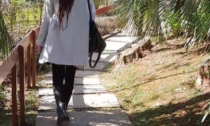 Woman Trips on Bag Strap