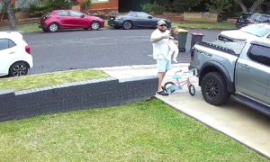 Kid Crashes Bike Into Pickup