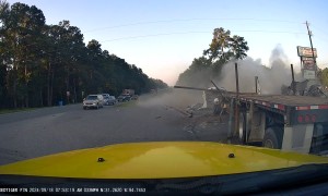 Dash Cam Captures Crash Between Semis