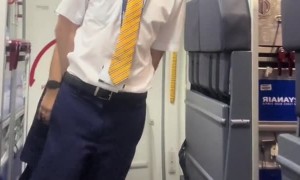 Flight Attendants Lean During Takeoff