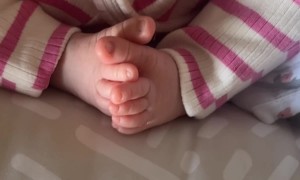 Baby Sleeps Best With Her Toes Interlocked