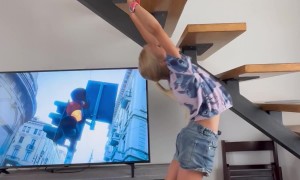 Acrobatic Girl Monkey Bars Backward Up Underside Of Staircase