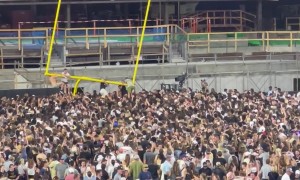 Crowd Dismantles Goal Post After College Football Game