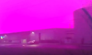 Morning Drive Under Eerie Magenta Sky