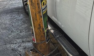 Truck Chained To Pole