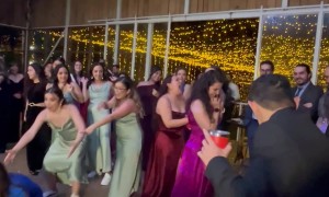 Wedding Guest Determined To Catch Bouquet Toss