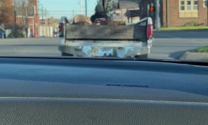 Lawnmower Hauls A Truck Bed Trailer