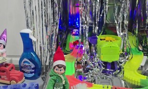 Santa's Elves Working At The Carwash