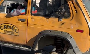 Duct Tape and Tree Branch Keep Car on the Road