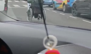 Man Tears Through City in His Wheelchair