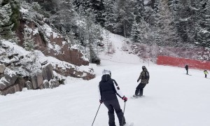 Snowboarder And Skier Have Mishap On Busy Slope