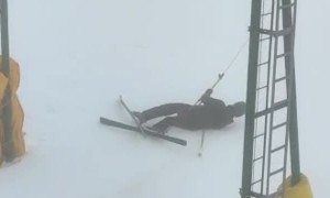 Skier Gets Slowly Dragged By Ski Lift
