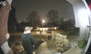 Truck Slowly Slides Down Icy Driveway