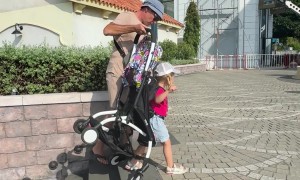 Dad's Method of Getting a Stroller Up Stairs