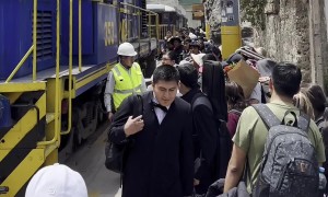 Woman Saved From Stepping In Front Of Moving Train