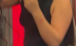 Woman Straightens Her in an Airport