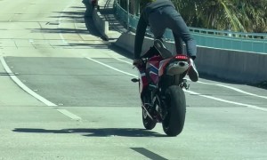 Standing Backward on a Moving Motorcycle