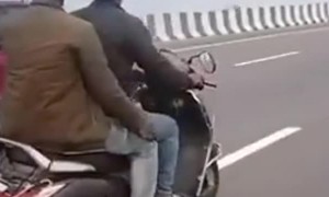 Car Shoves Moped For Kilometers