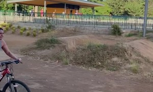 Girl Wipes Out on BMX Course