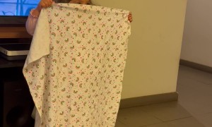 Miniature Magician Misunderstands Disappearing Blanket Trick