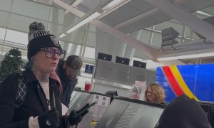 Overwhelmed Air Passenger Turns Racist