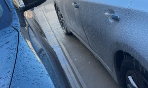 Silly Husband Pops Head Through Ice To Say Goodbye