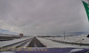 Truck Loses Control On Black Ice Bridge