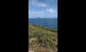 Police Helicopter Cooperates With Posing Tourists