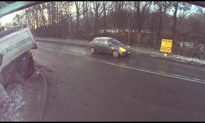 Extremely Near Miss as Truck Slips Off Road
