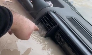 Land Rover Gets Stuck in River