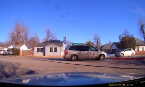 SUV Driver Forgets to Strap Down Ladder