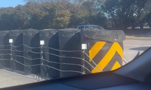 Car Drives in Reverse Down Interstate