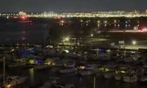 Search And Rescue Fly Over Potomac Crash Site