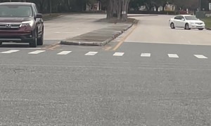 Wrong-Way Driver Slowly Reverses Away From Intersection