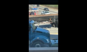 Delivery Robot Attempts To Cross Busy Intersection