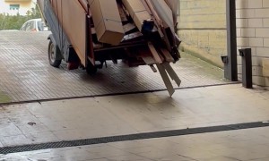 Overloaded Vehicle Falls Backwards